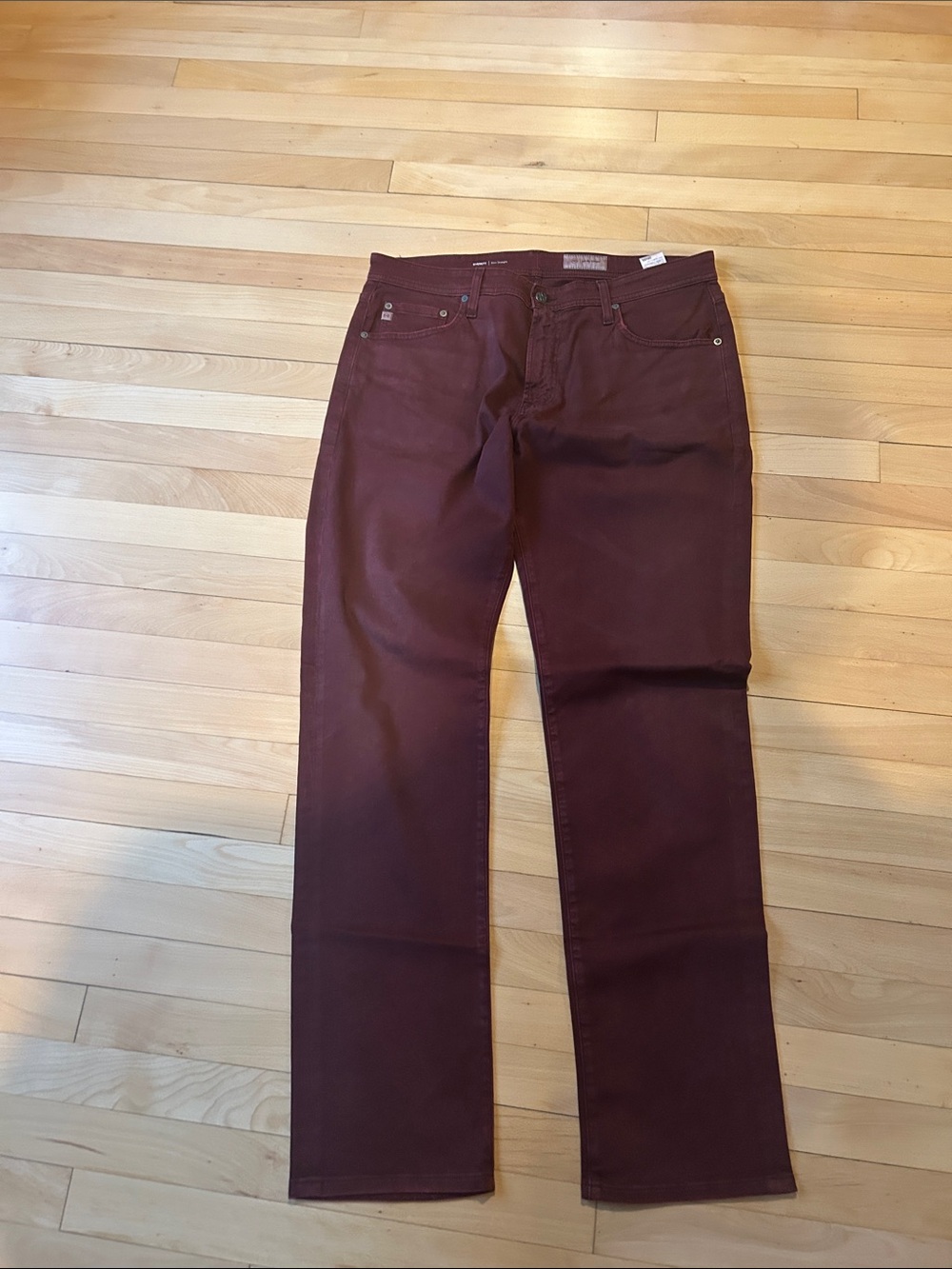 AG Adriano Goldschmied Men's Straight Jeans in Burgundy